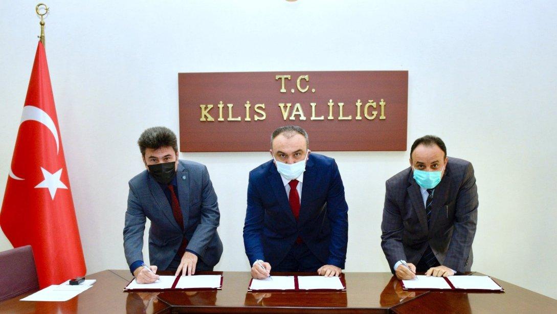 Kilis Valiliği, 7 Aralık Üniversitesi ve Müdürlüğümüz arasında arsa tahsisi protokolü imzalandı.